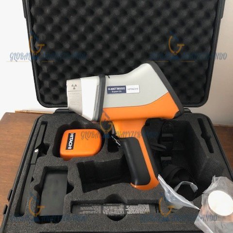 “Hitachi X-MET 8000 Expert Geo handheld XRF analyzer measuring soil on-site”