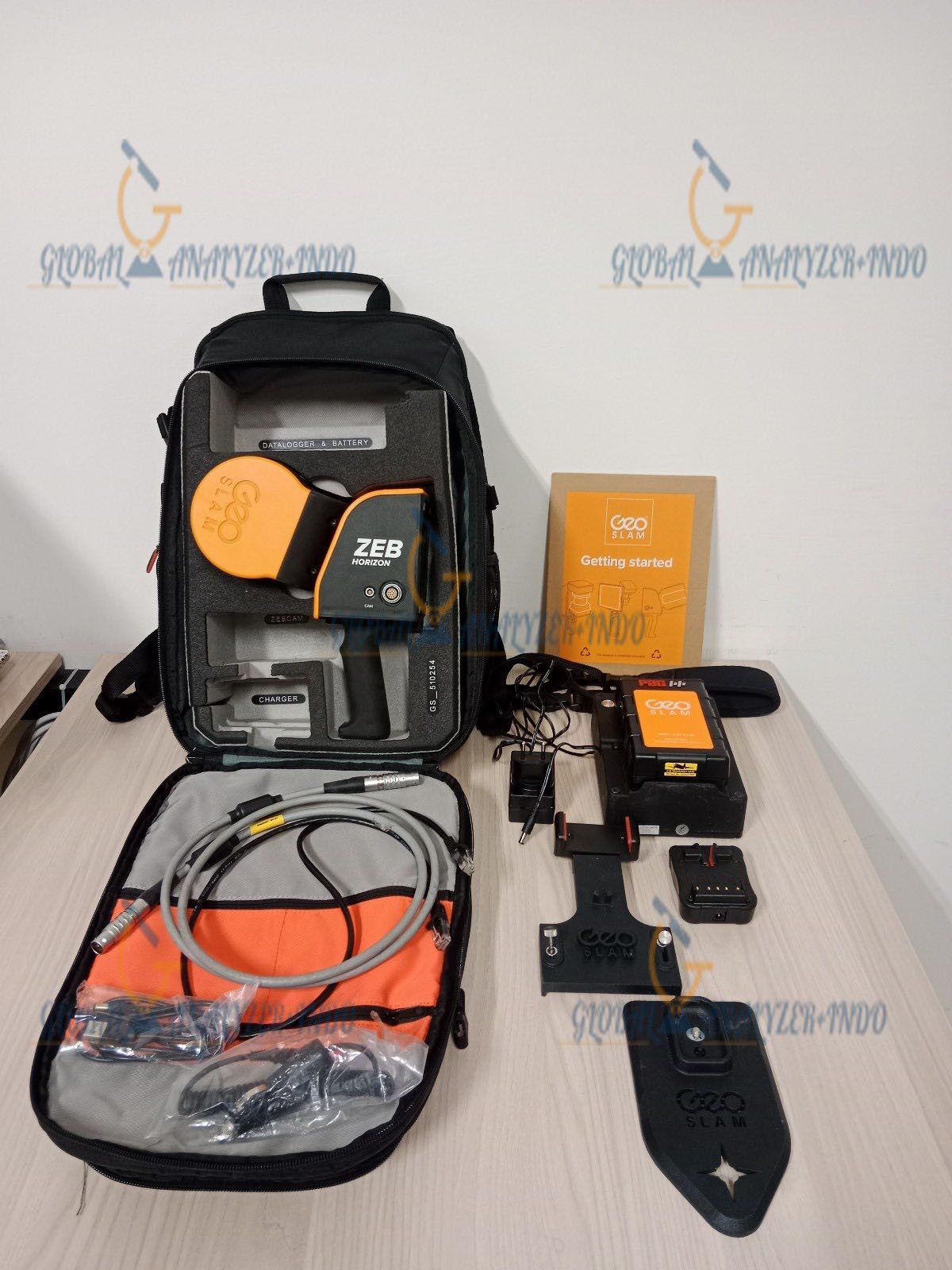 GeoSLAM ZEB-HORIZON capturing 3D scans at a construction site.