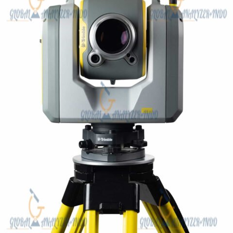 Trimble SX12 total station with green focusable laser pointer capturing survey data.