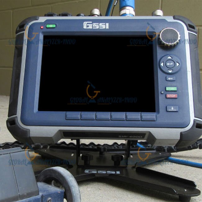 Technician operating GSSI SIR 4000 GPR Controller in the field