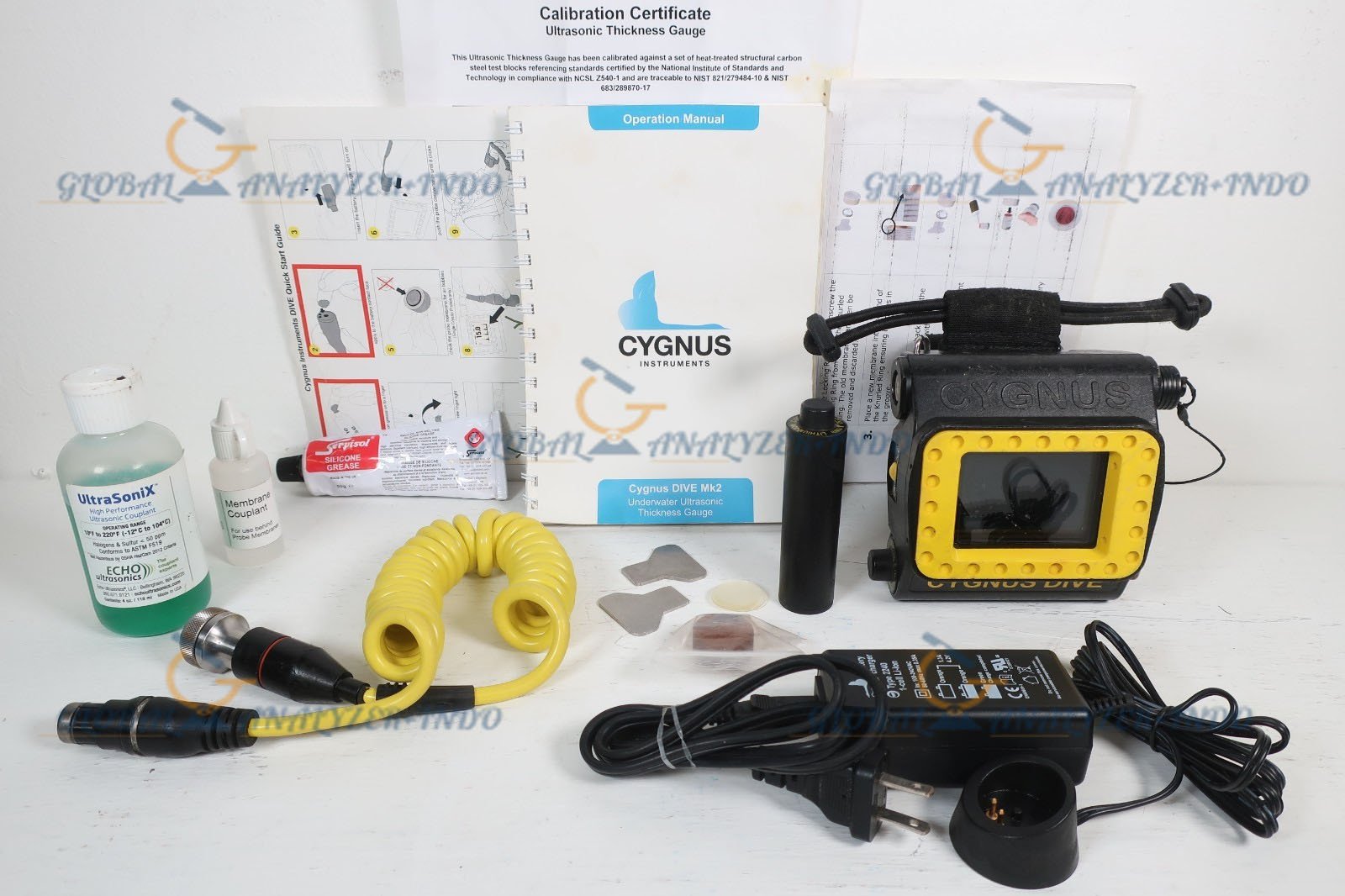 Diver using Cygnus DIVE Mk2 to measure metal thickness underwater